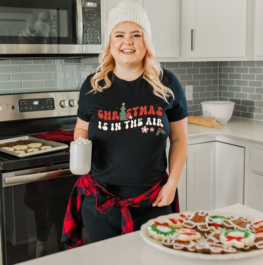 Christmas Is In The Air Unisex T-shirt: Embrace the Festive Spirit