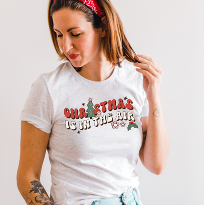 Christmas Is In The Air Unisex T-shirt: Embrace the Festive Spirit