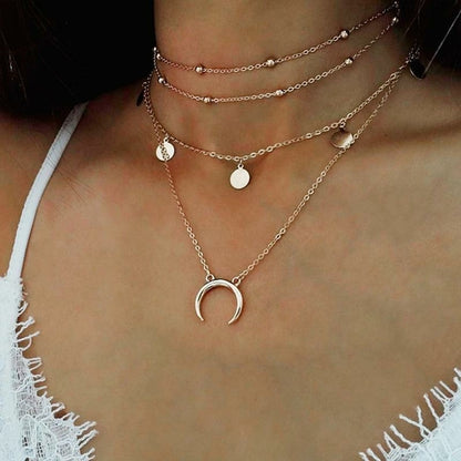 Luminary Layers: Crescent Horn Moon Necklace