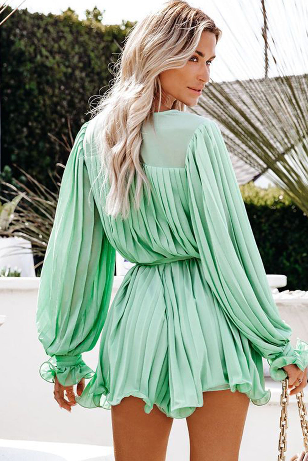Chic Green Pleated V-Neck Romper with Ruffle & Tie Waist Detail
